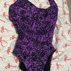 A purple one peace bathing suit